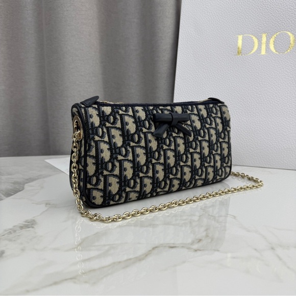 Dior. Handbags - Dior Oblique Canvas Chain Clutch with Bow
